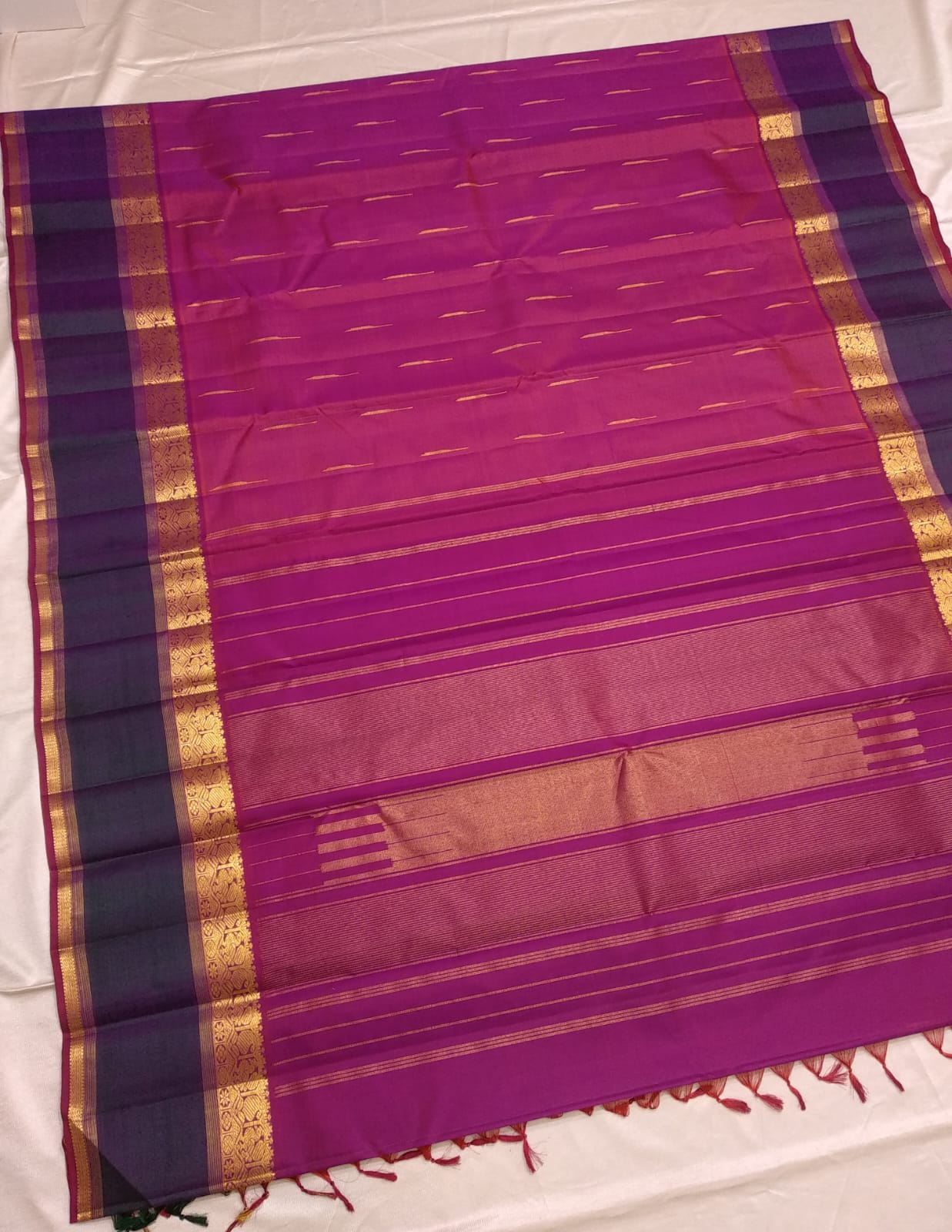 Handloom Kanchipuram Silk Saree with a Korvai border.